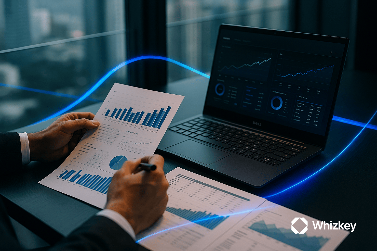 Business professional in Kuwait reviewing printed financial charts with a laptop showing data dashboards, enhanced with subtle blue and turquoise accents symbolizing ROI analysis.