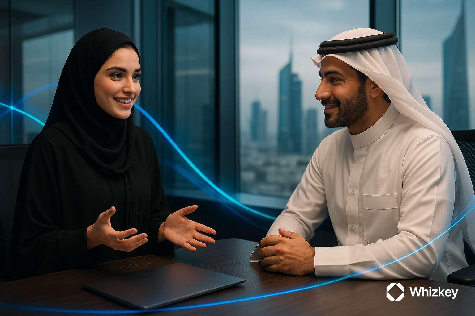 Kuwaiti executive collaborating with IT manager to align digital transformation priorities